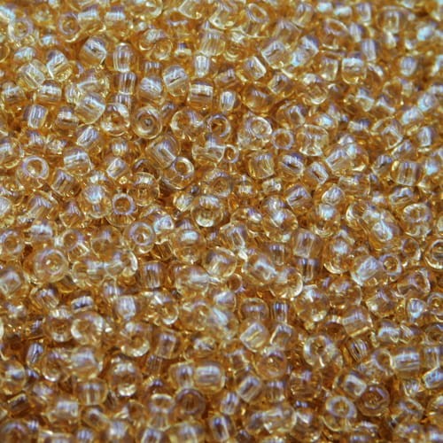 toho-koraliki-round-11-0-transparent-lt-topaz-bursztynowo-zloty-przezroczysty