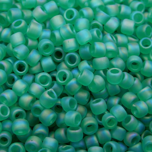 TOHO Round 8/0 Transparent-Rainbow-Frosted Dk Peridot (10g)