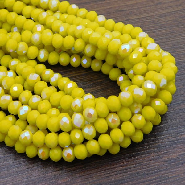 Oponki fasetowane ze szkła 6x4.5mm żółte AB (85szt.)