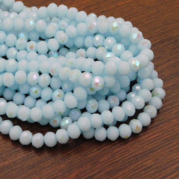 Oponki fasetowane ze szkła 6x4.5mm jasno niebieskie AB (85szt.)